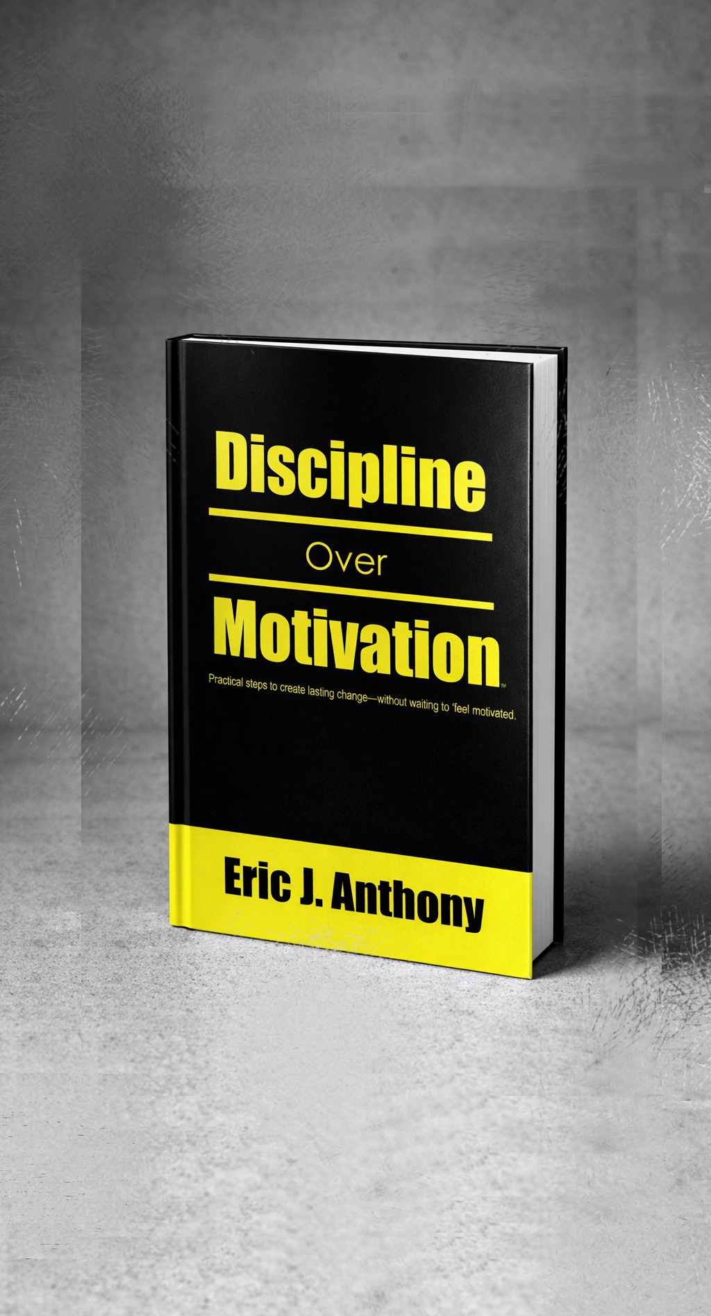 Book titled 'Discipline Over Motivation' by Eric J. Anthony on a gray background